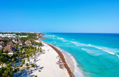 Scenic view of sea against clear blue sky