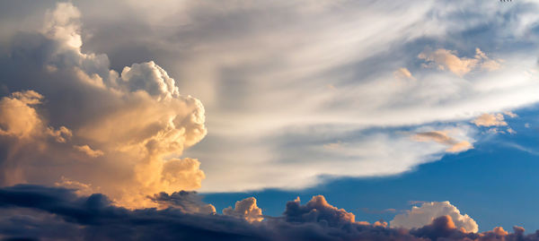 Low angle view of cloudscape against sky during sunset