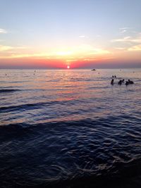 Scenic view of sea at sunset