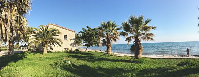 Scenic view of calm sea against clear sky