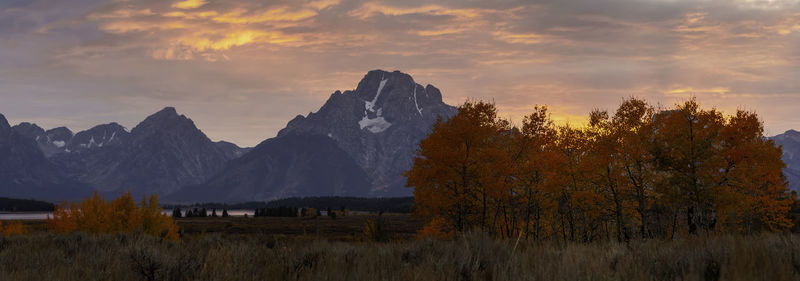 Scenic view of mountains against sky during sunset