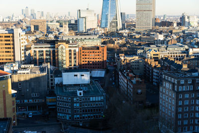 High angle view of modern buildings in city