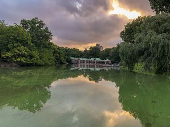 Scenic view of lake against sky during sunset