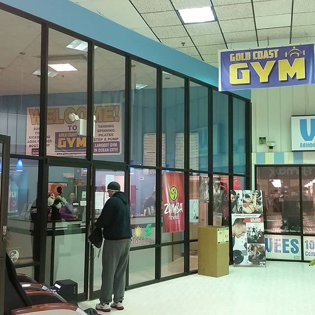 text, communication, indoors, western script, men, transportation, non-western script, built structure, architecture, public transportation, information sign, railroad station, person, lifestyles, sign, store, city, glass - material, airport