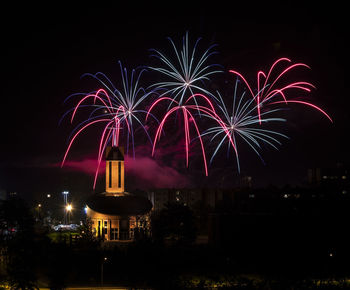 Firework display at night