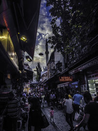 People walking on street in city