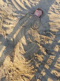 High angle view of boy on beach