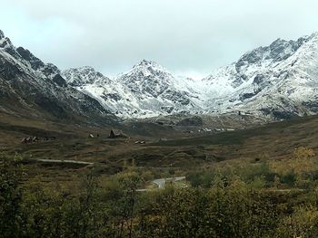 Scenic view of snowcapped mountains against sky