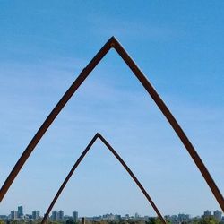 Low angle view of built structure against blue sky