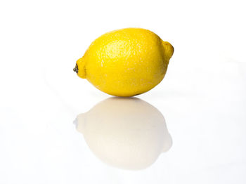 Close-up of fruits against white background