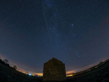 Low angle view of stars against sky at night