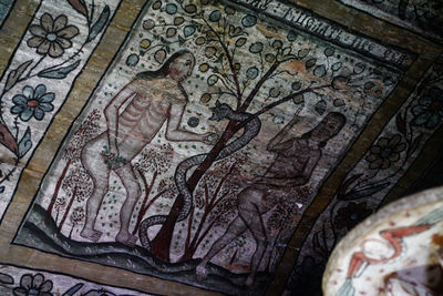 Close-up of carving on ceiling of historic building