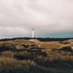 Lighthouse on field