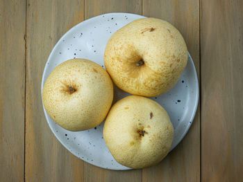 High angle view of apples in plate