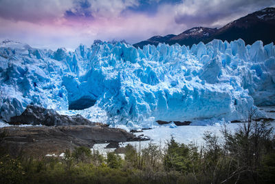 Scenic view of frozen lake against sky