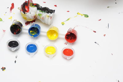 High angle view of multi colored candies on table