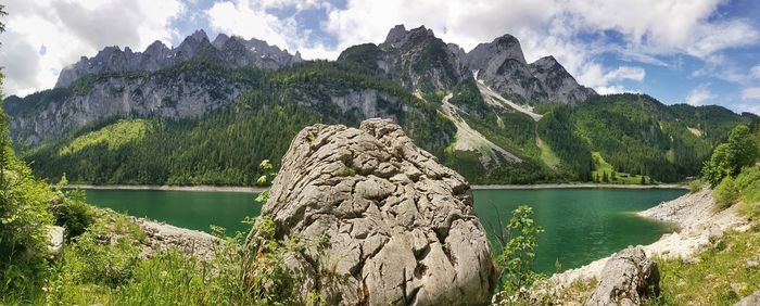 Panoramic view of lake and mountains against sky