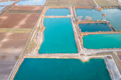 High angle view of turquoise colored quarry ponds