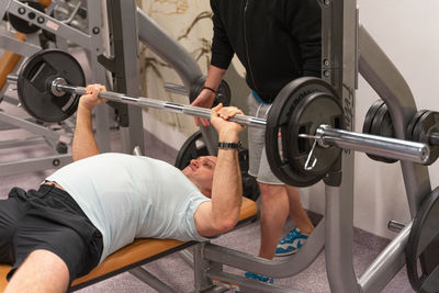 A man works out in the gym