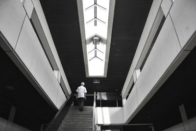 Full length of woman standing in front of building