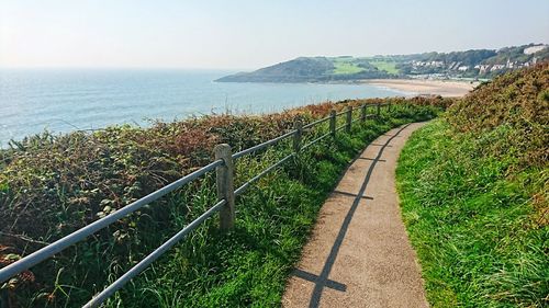 Scenic view of calm sea against clear sky