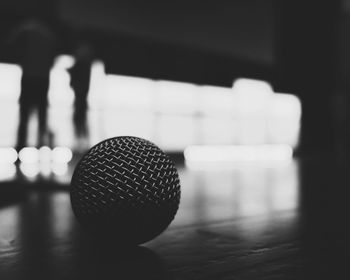 Close-up of microphone on table