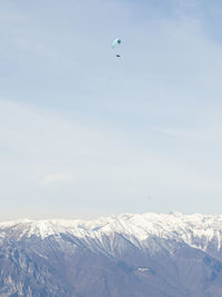 Scenic view of snowcapped mountain against sky