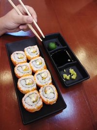 High angle view of sushi served on table