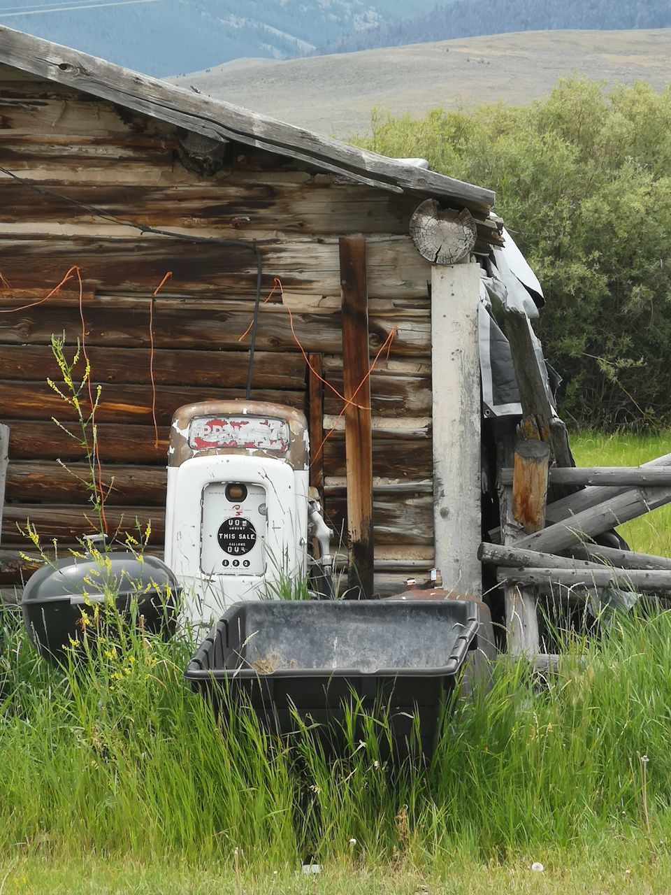 OLD ABANDONED TRUCK ON FIELD