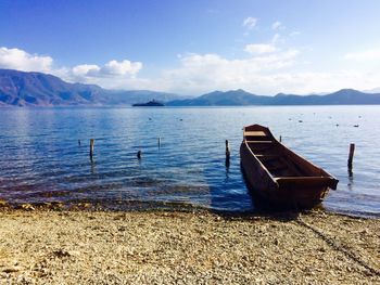 Boat moored on lugu lake