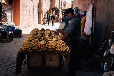 Man working at market stall