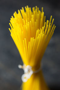 Close-up of raw spaghetti on table