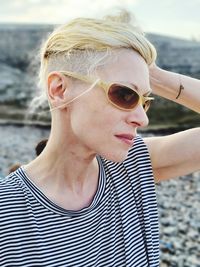 Portrait of mid adult man wearing sunglasses