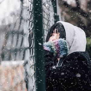 Portrait of a boy in rain