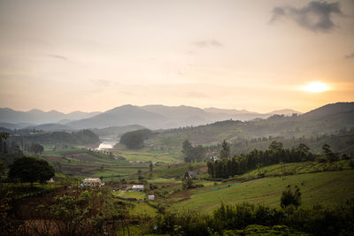 Scenic view of landscape against sky during sunset