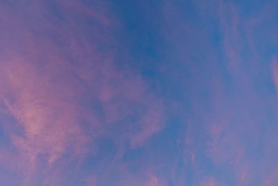 Low angle view of cloudy sky during sunset