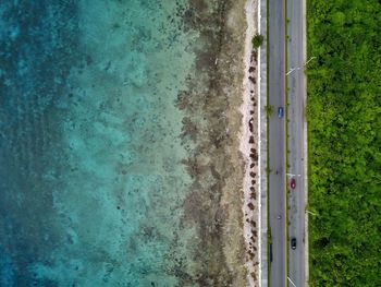 High angle view of highway by emerald beach in cozumel island.