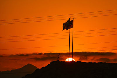 Scenic view of orange sky