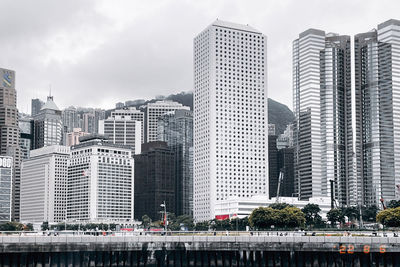 Modern buildings in city against sky