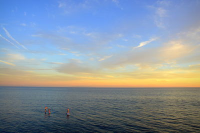 Scenic view of sea at sunset