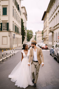 Full length of couple on road 