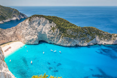 High angle view of rocks by sea