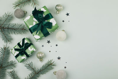 Directly above shot of christmas decorations on white background