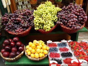 Various fruits for sale at market stall