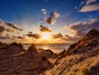 Scenic view of sea against sky during sunset
