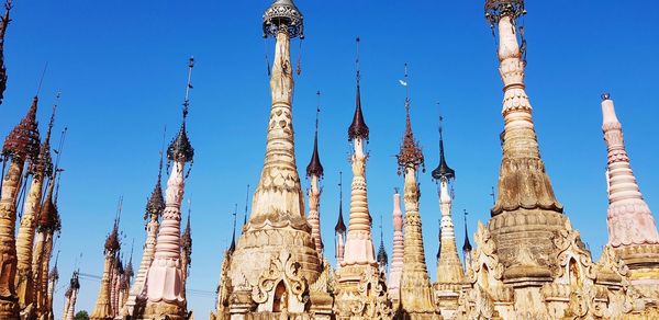 Low angle view of temple against building