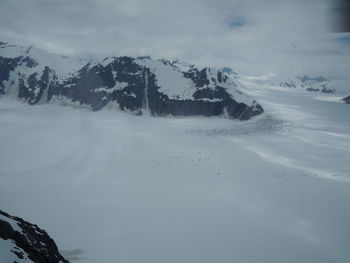 Scenic view of snow covered mountains