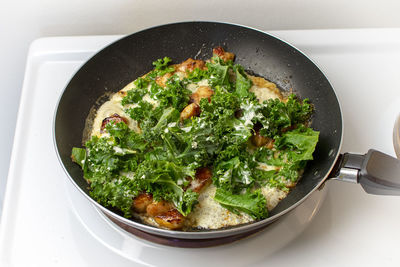 High angle view of vegetables in bowl on table