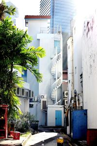 Street amidst buildings against sky