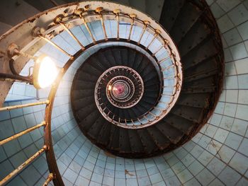 Low angle view of spiral staircase of lighthouse